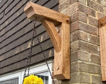 Elevate your garden with the Gallow Solid Oak Outdoor Hanging Basket Bracket, a durable and stylish addition for showcasing your hanging plants. Handcrafted from solid oak for lasting charm.